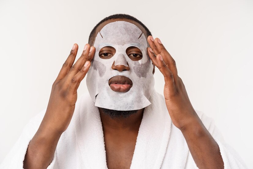 young man with paper mask face looking shocked with open mouth isolated white background 1258 104774